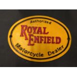 A ROYAL ENFIELD MOTORCYCLE DEALER CAST SIGN