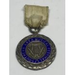 A HALLMARKED BIRMINGHAM SILVER 1930 SOUTHERN AREA MUSIC FESTIVAL MEDAL