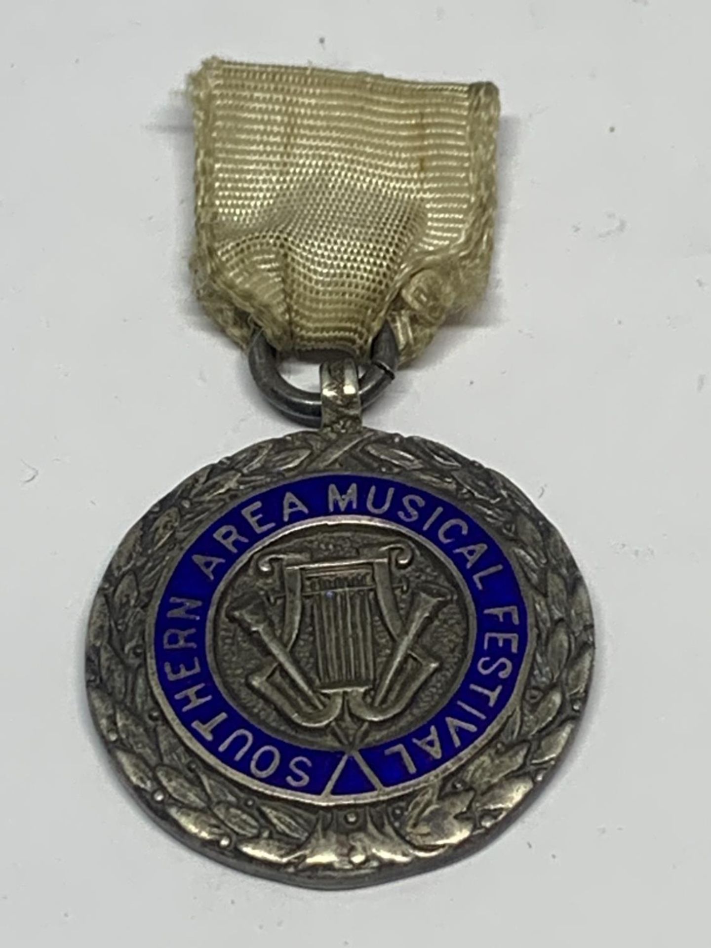 A HALLMARKED BIRMINGHAM SILVER 1930 SOUTHERN AREA MUSIC FESTIVAL MEDAL