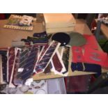 A QUANTITY OF TIES WITH EMBLEMS ON THEM, MILITARY STYLE BELTS, PLACE MATS, BERETS, ETC
