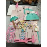 A CHILD'S WOODEN PRINCESS AND CASTLE SET WITH ASSEMBLY INSTRUCTIONS