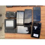 FIVE VARIOUS SMART PHONES, A SAMSUNG CAMERA AND A TOMTOM SATNAV