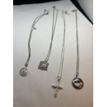 FOUR MARKED SILVER PENDANTS TO INCLUDE A CROSS, HEART PENDANT ETC
