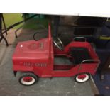 A CHILD'S 'FIRE CHIEF' METAL PEDAL CAR
