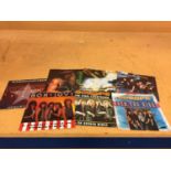SEVEN SINGLE RECORDS WITH PICTURE SLEEVES TO INCLUDE BON JOVI, EUROPE, DEF LEPPARD, ETC