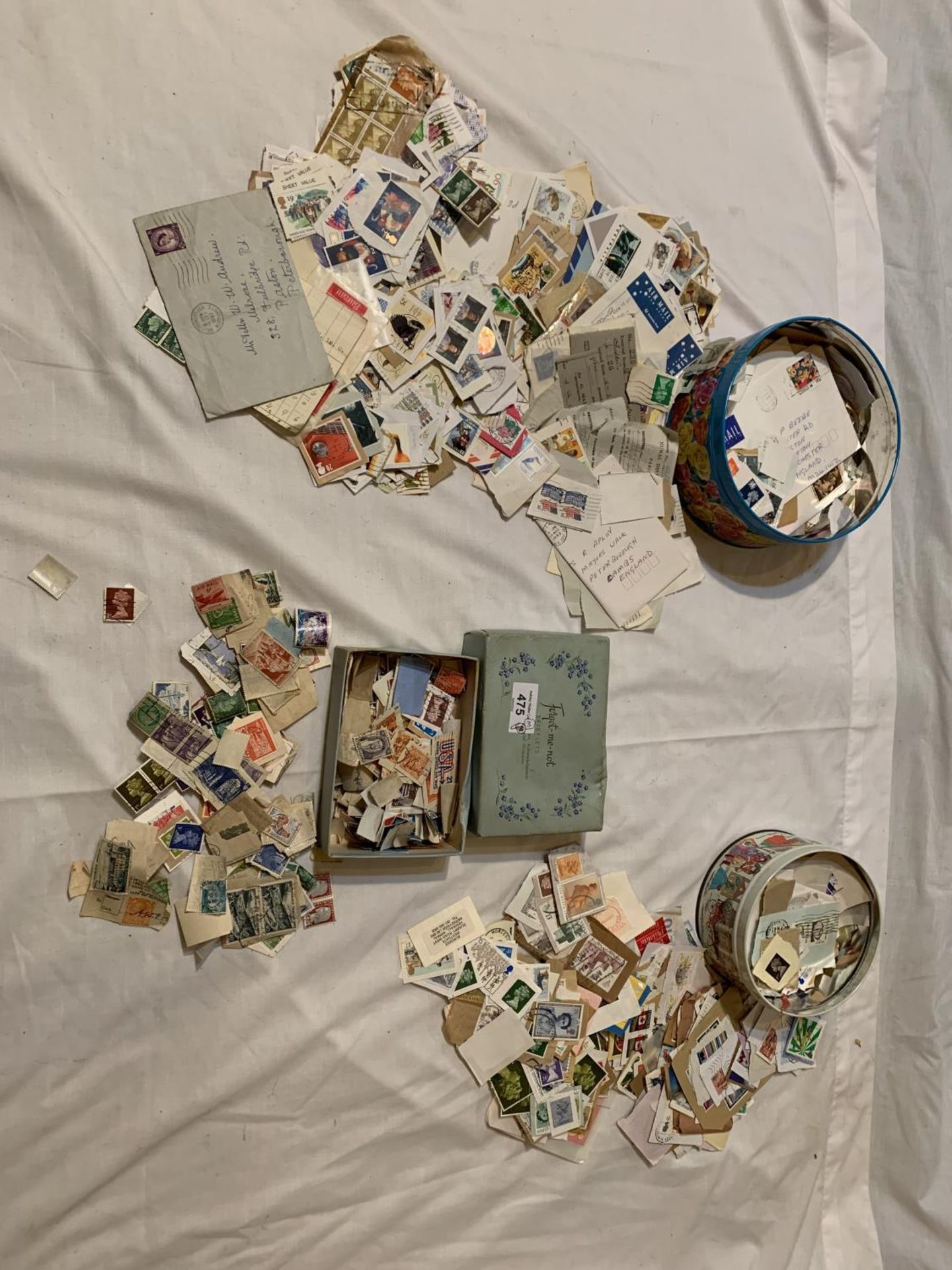 TWO TINS AND A BOX CONTAINING VARIOUS LOOSE STAMPS