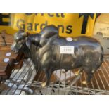 A COLD PAINTED BRASS BULL FIGURE