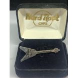 A MARKED STERLING SILVER HARD ROCK CAFE GUITAR BADGE IN ORIGINAL PRESENTATION BOX