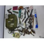 A COLLECTION OF SHOOTING EPHEMERA, TO INCLUDE CLEANING BRUSHES, MULTI TOOLS, OIL BOTTLE ETC