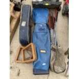 AN ASSORTMENT OF VINTAGE SPORTS EQUIPMENT TO INCLUDE TENNIS RACKETS, GOLF CLUBS AND RACKET COVERS