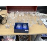 AN ASSORTMENT OF GLASS WARE TO INCLUDE TUMBLERS, WINE GLASSES AND SHERRY GLASSES ETC