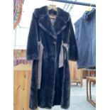 A LADIES TISSAVEL FAUX FUR COAT