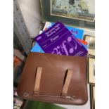 TWO LEATHER SATCHELS, ONE CONTAINING PIANO LESSON BOOKS AND MUSIC