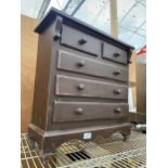 AN APPRENTICE PIECE CHEST OF DRAWERS ENCLOSING TWO SHORT AND THREE LONG DRAWERS