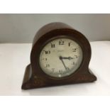 A SMALL INLAID MAHOGANY NAPOLEONS HAT 8 DAYS MANTLE CLOCK 14CM HIGH