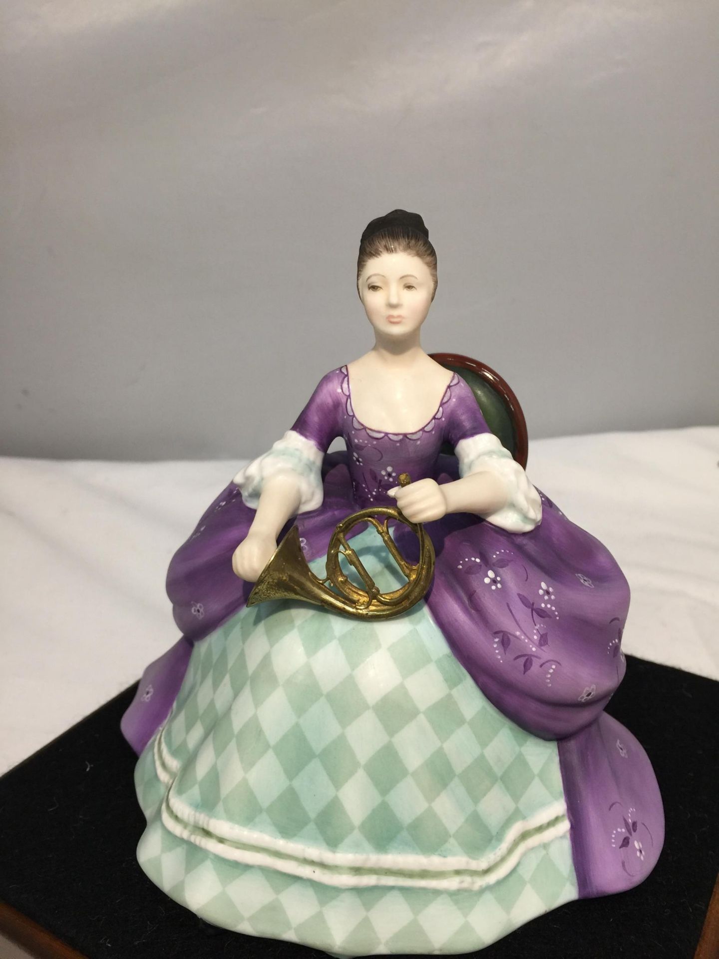 A ROYAL DOULTON FIGURINE, FRENCH HORN HN2795, MODELLED BY PEGGY DAVIES AS PART OF THE LADY MUSICIANS - Image 2 of 7