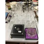 A SELECTION OF MAINLY CRYSTAL GLASSWARE TO INCLUDE DRINKING GLASSES, VASES, JUGS AND A BOXED ROSE