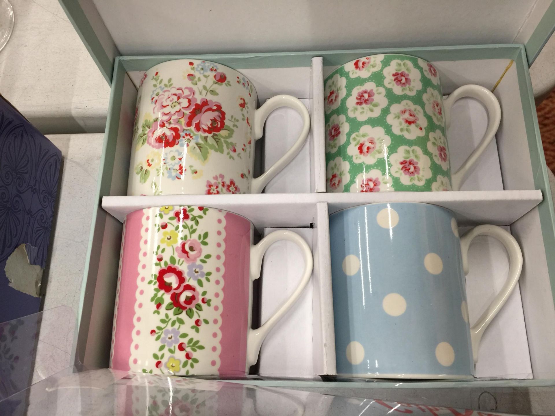 FOUR BOXED CATH KIDSTON MUGS