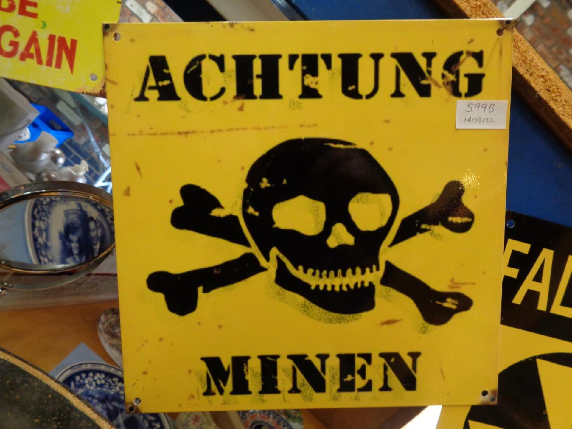 A METAL ACHTUNG MINEN SIGN