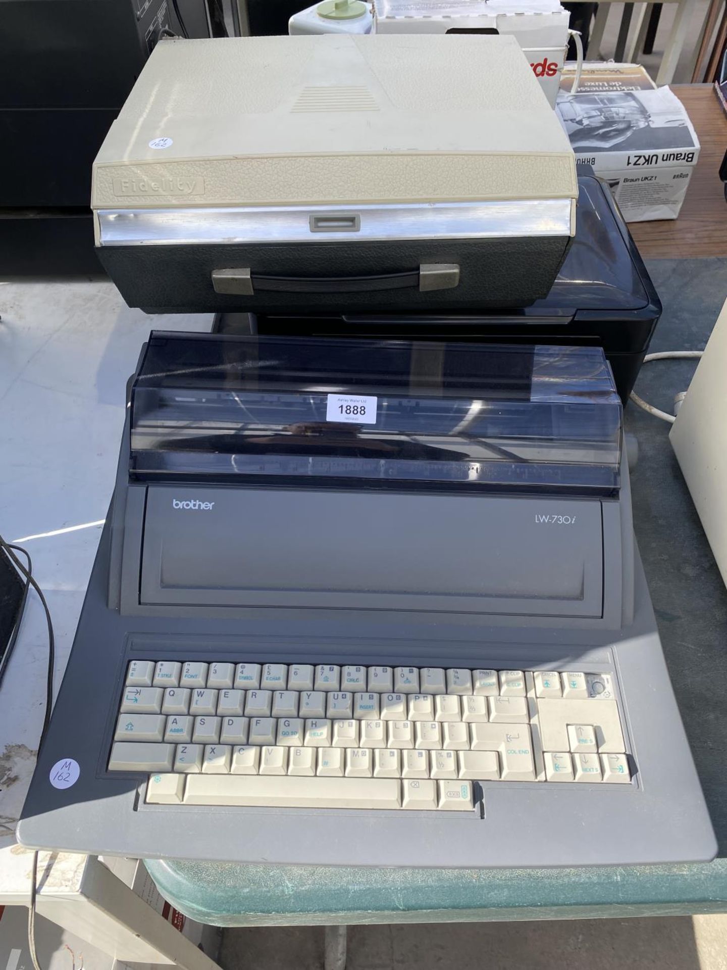 A BROTHER TYPEWRITER, A FIDELITY TAPE TO TAPE PLAYER AND AN EPSON PRINTER