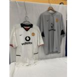 TWO MANCHESTER UNITED SHIRTS, ONE GREY SIZE XXL AND ONE WHITE SIZE 42/44