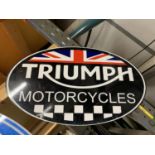 A TRIUMPH MOTORCYCLE METAL SIGN