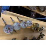 TWO SETS OF BED KNOBS TO INCLUDE BRASS AND FLORAL CERAMIC