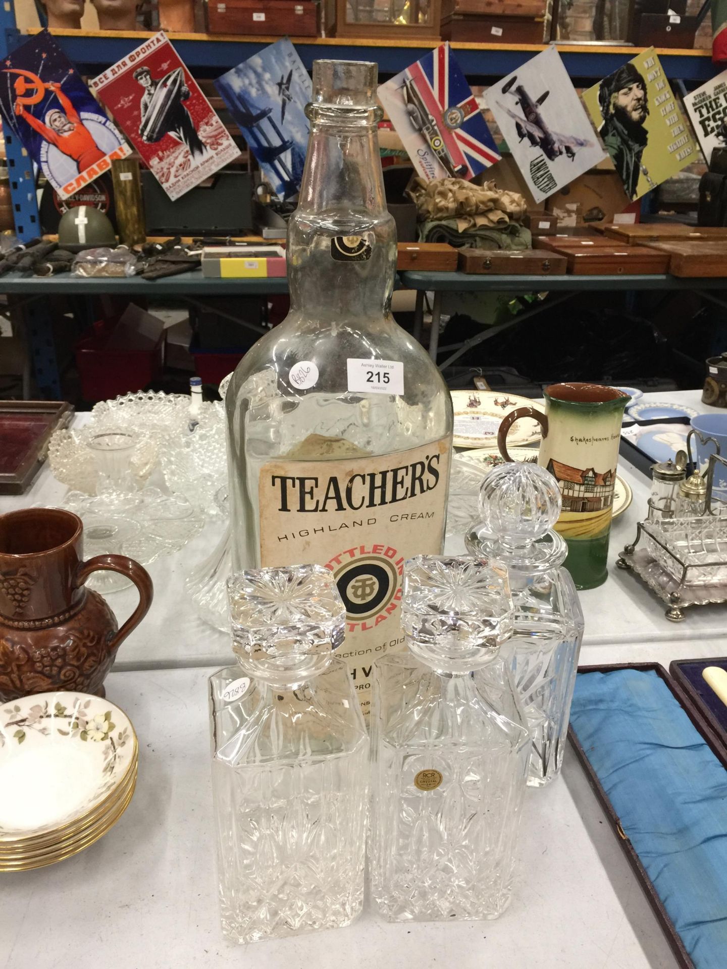 A LARGE TEACHERS SCOTCH WHISKY BOTTLE AND THREE DECANTERS