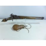 A NON-FIRING REPLICA MIQUELET LOCK PISTOL, LENGTH OF BARREL 33CM, COPPER AND BRASS POWDER FLASK (2)