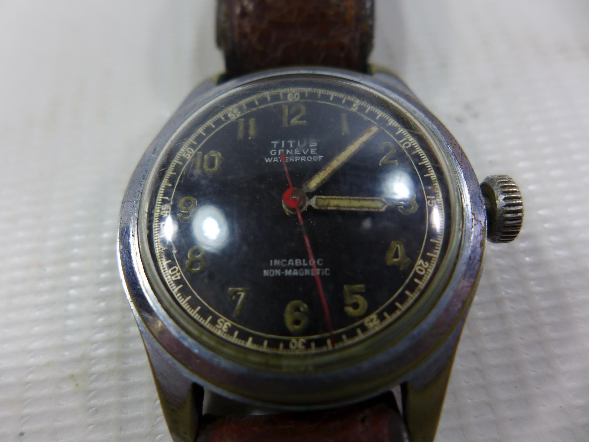 A TITUS MANS WRISTWATCH, DIAMETER OF FACE 2.5CM, NOT WORKING WHEN CATALOGUED