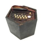 A VINTAGE CONCERTINA IN A WOODEN STORAGE BOX (NO LID)