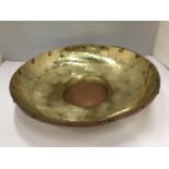 A LARGE BRASS BOWL WITH COPPER RIM AND BASE 35CM DIAMETER