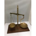 A PAIR OF VINTAGE BRASS BALANCE SCALES