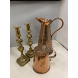 TWO COPPER JUGS AND A PAIR OF BRASS CANDLESTICKS