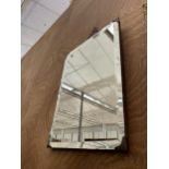 A VINTAGE ART DECO UNFRAMED BEVELED EDGE MIRROR