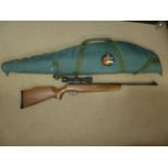 A S.M.K. 19-18 .22 CALIBRE AIR RIFLE, 42CM BARREL, SMK 4X32 TELESCOPIC SIGHTS, TIN OF PELLETS AND