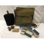 A WORLD WAR II MILITARY CANVAS BAG AND CONTENTS, COMPRISING WATER BOTTLE, DRESSINGS, OINMENT TINS