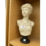 A RESIN BUST OF A FEMALE