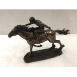 A VERONESE RESIN FIGURE OF A GALLOPING RACEHORSE WITH JOCKEY