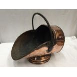 A LARGE VINTAGE COPPER COAL SCUTTLE