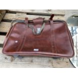 A VINTAGE ANTLER SUITCASE SIZE 65CM X 44CM