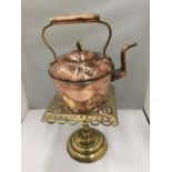 A BRASS HEARTH STAND AND A COPPER AND BRASS KETTLE WITH AN ACORN TOP