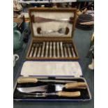 A WOODEN CASED 'MAPPIN & WEBB' CANTEEN OF FISH CUTLERY TOGETHER WITH FURTHER CASED CARVING SET