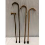 FOUR VARIOUS WOODEN WALKING STICKS