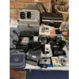 A LARGE COLLECTION OF CAMERAS, LENSES, STORAGE BOXES, ACCESSORIES, VIDEO CAMERA ETC.