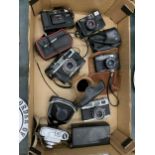 A LARGE COLLECTION OF CAMERAS INCLUDING CANON, BEIRETTE, RANK MAMIYA ETC.