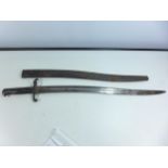 A BRITISH YATAGHAN BLADED 1856/58 BAYONET, 58CM BLADE WITH VARIOUS STAMPED MARKS, COMPLETE WITH