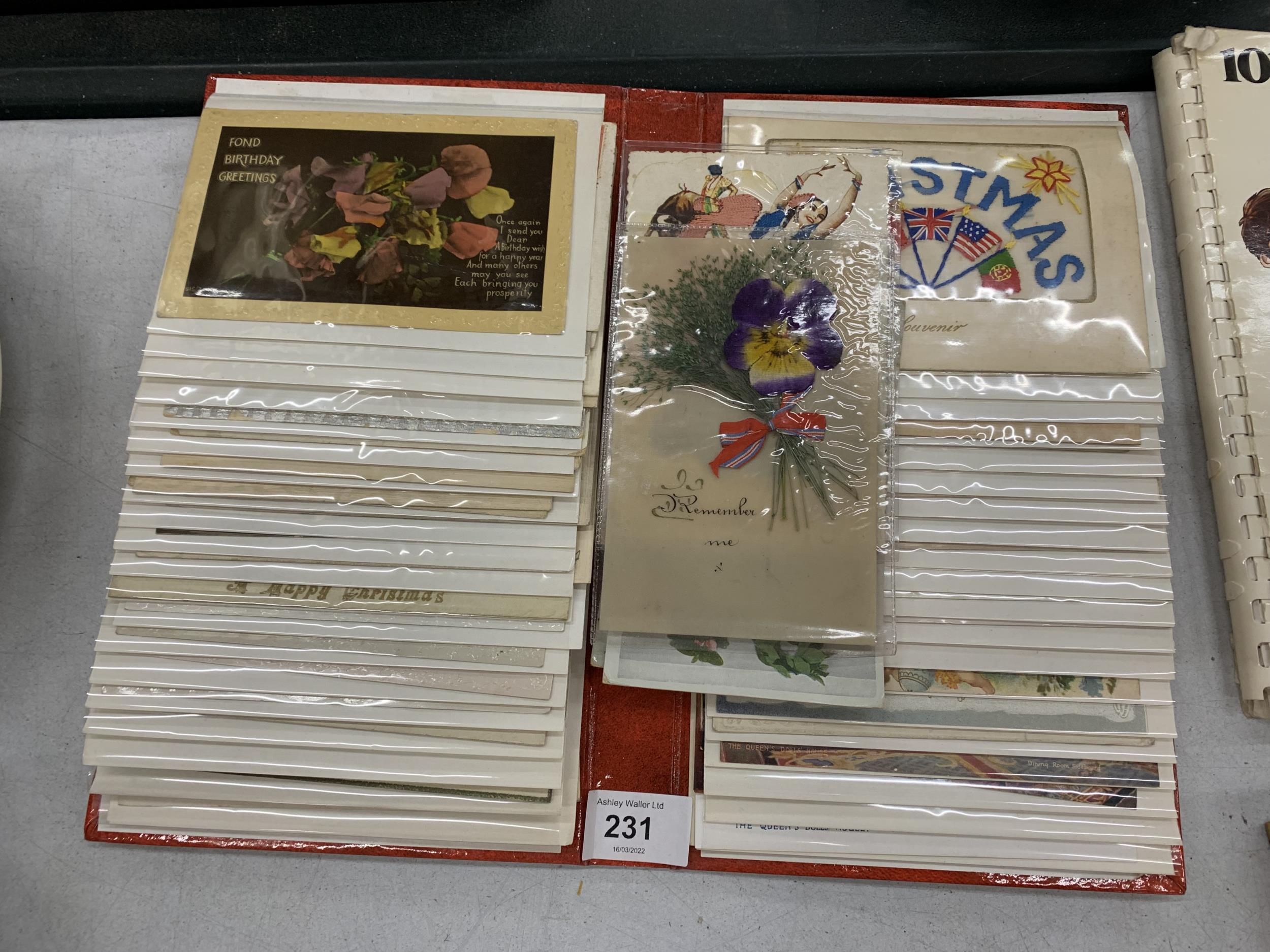 A PHOTO ALBUM CONTAINING VINTAGE POSTCARDS AND GREETINS CARDS, SOME HAND EMBROIDERED