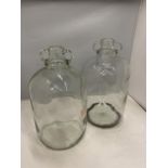 TWO GLASS DEMIJOHNS