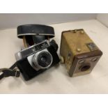 TWO CAMERAS TO INCLUDE A HALINA PAULETTE ELECTRIC FILM CAMERA AND A KODAK BROWNIE FLASH B